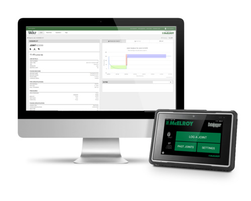 A desktop computer displaying data and graphs next to a handheld electronic device showing a green user interface with options like “LOG A JOINT” and “SETTINGS.” Both screens show technical information.