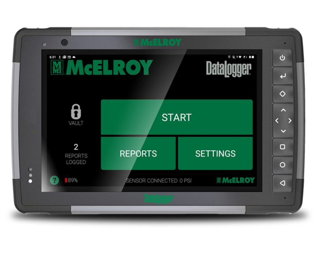 A McElroy DataLogger tablet showing a touchscreen interface with large green buttons labeled Start, Reports, and Settings, along with status indicators and report information.