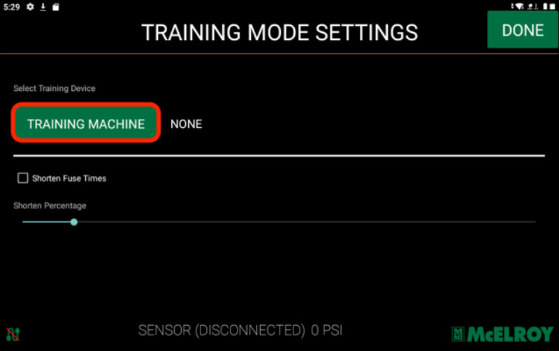 A touchscreen displays TRAINING MODE SETTINGS with TRAINING MACHINE selected and highlighted in green. Other options and sliders are visible. DONE is in the top right corner. McElroy logo is at the bottom right.