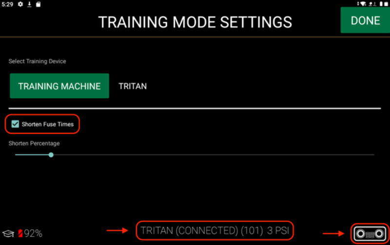 A screen titled Training Mode Settings shows options for selecting a training device, shortening fuse times, and a status bar at the bottom indicating TRITAN (CONNECTED) (101) 3 PSI along with battery and signal icons.