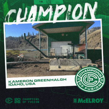 A fenced industrial site with equipment and a green metal-roofed shelter sits in a rural, hilly landscape. Overlaid text announces Kameron Greenhalgh as a Champion of Fusion 2026 from Idaho, USA.